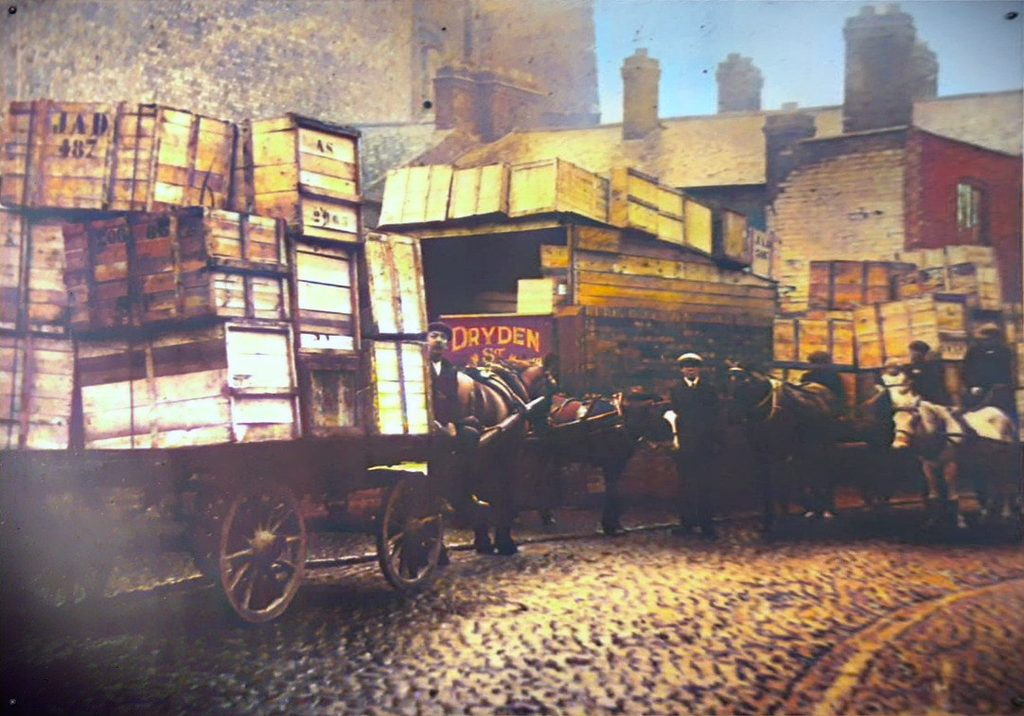 Photo of Siddons Packaging in c1900 at Wharf Street / Dryden Street, in Leicester. Wooden crates loaded on horse driven carts on the cobbled streets.